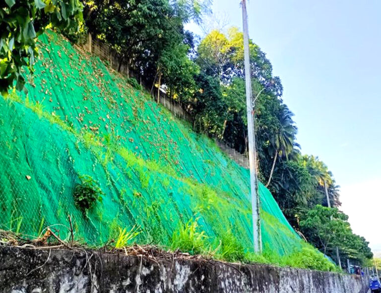 Construction of Road Slope Protection using Rockfall Netting - Matina Crossing, Davao City
